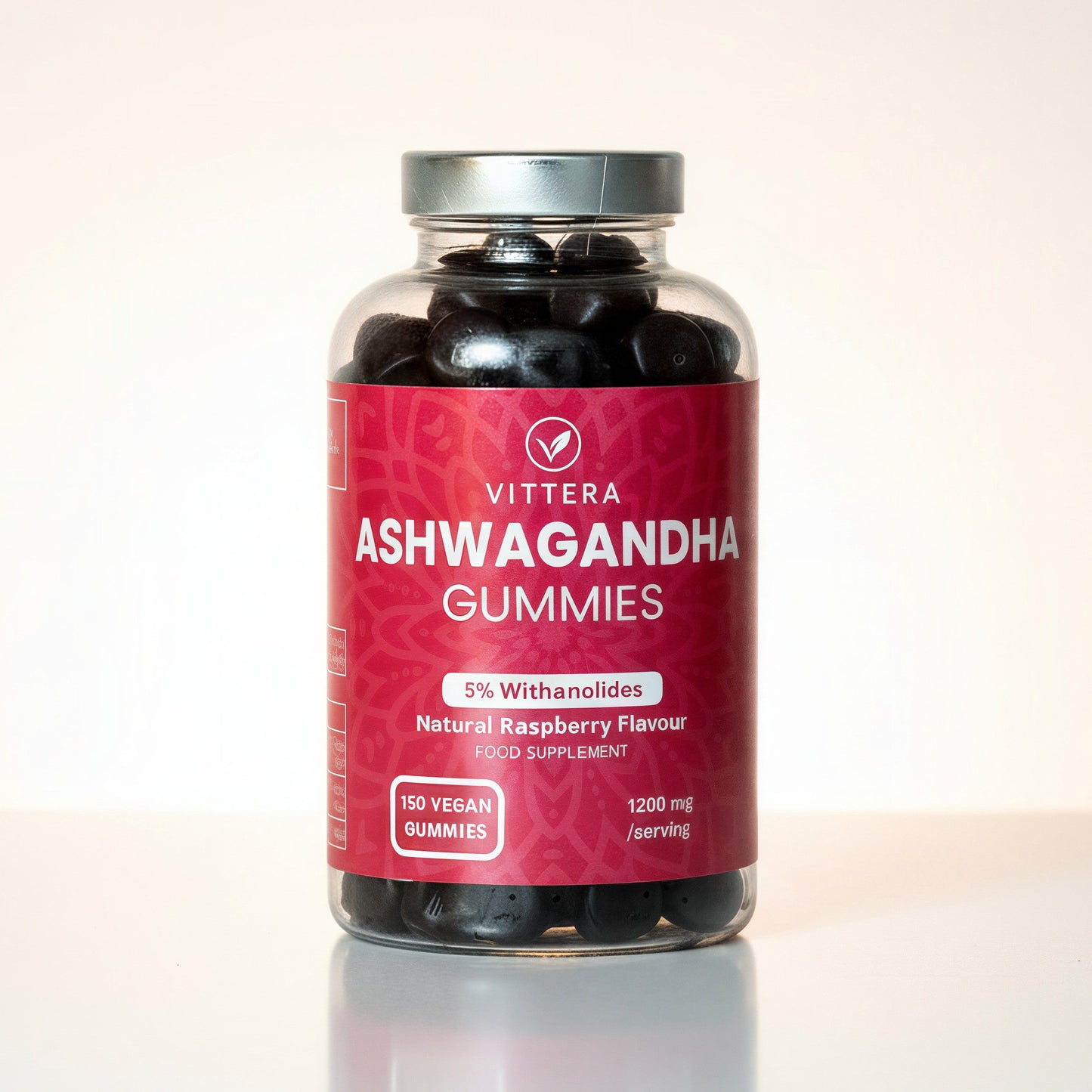 Bottle of Vittera Ashwagandha Gummies on a reflective surface with a light background